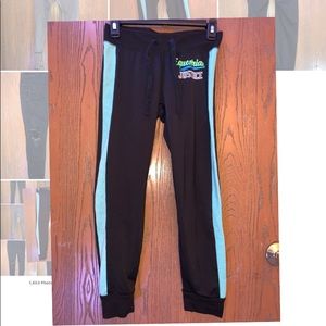 Super cute black “equestrian justice” joggers